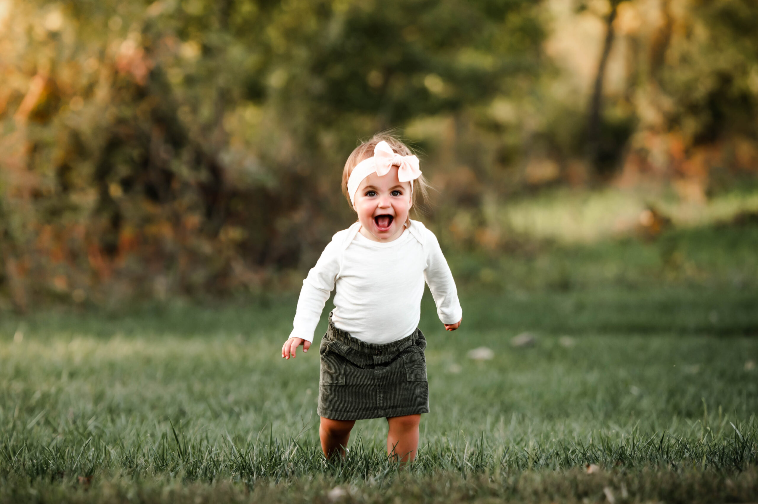 Toddler girl laughing at the park in dayton oh